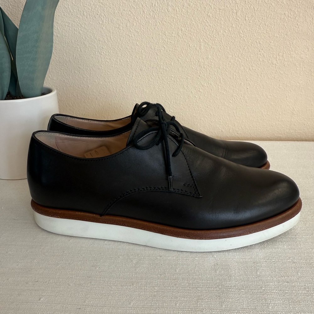 TOD’S Black Leather Oxfords with White Sole